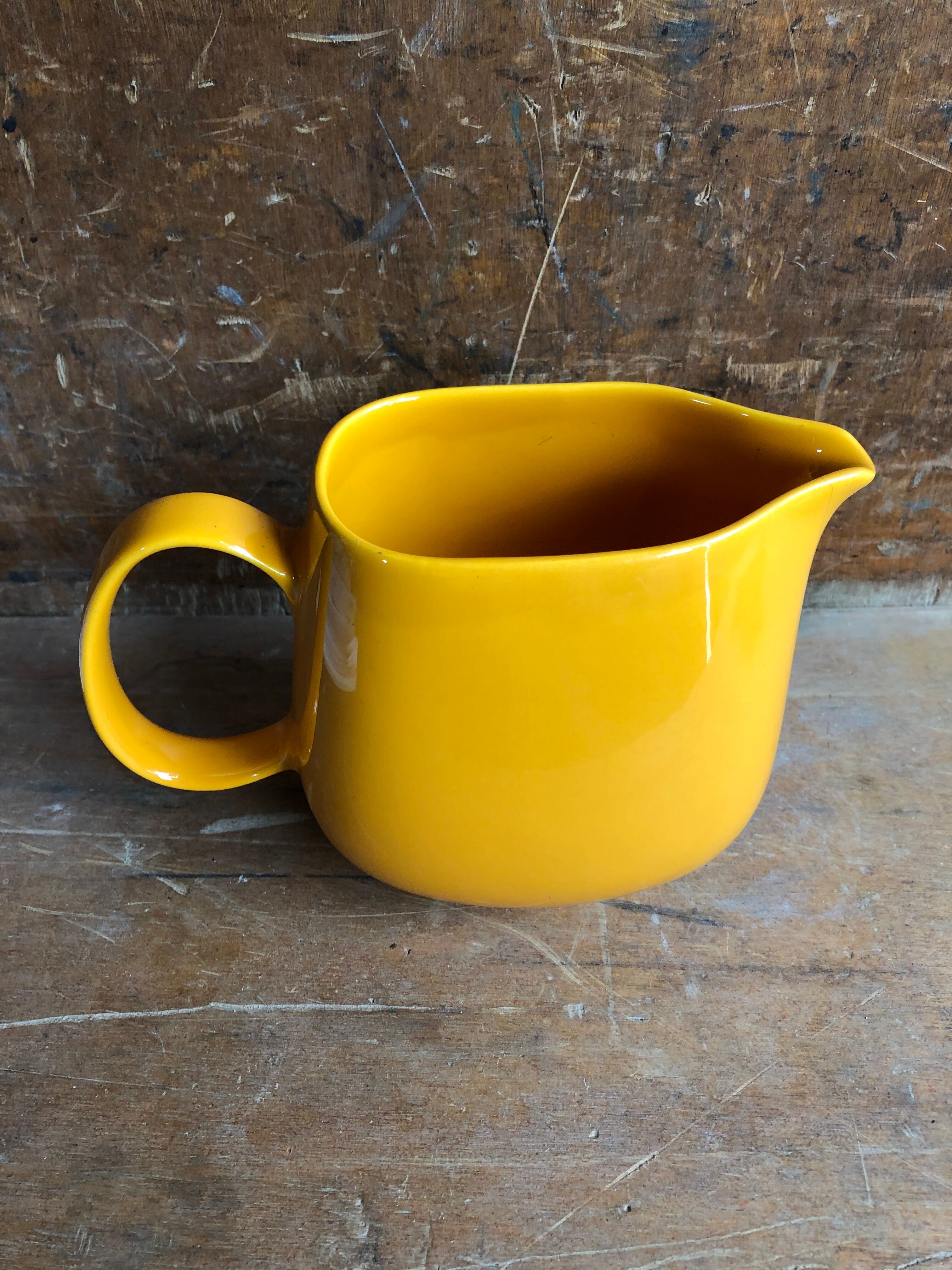 Old yellow ceramic pitcher made in germany 70s vintage