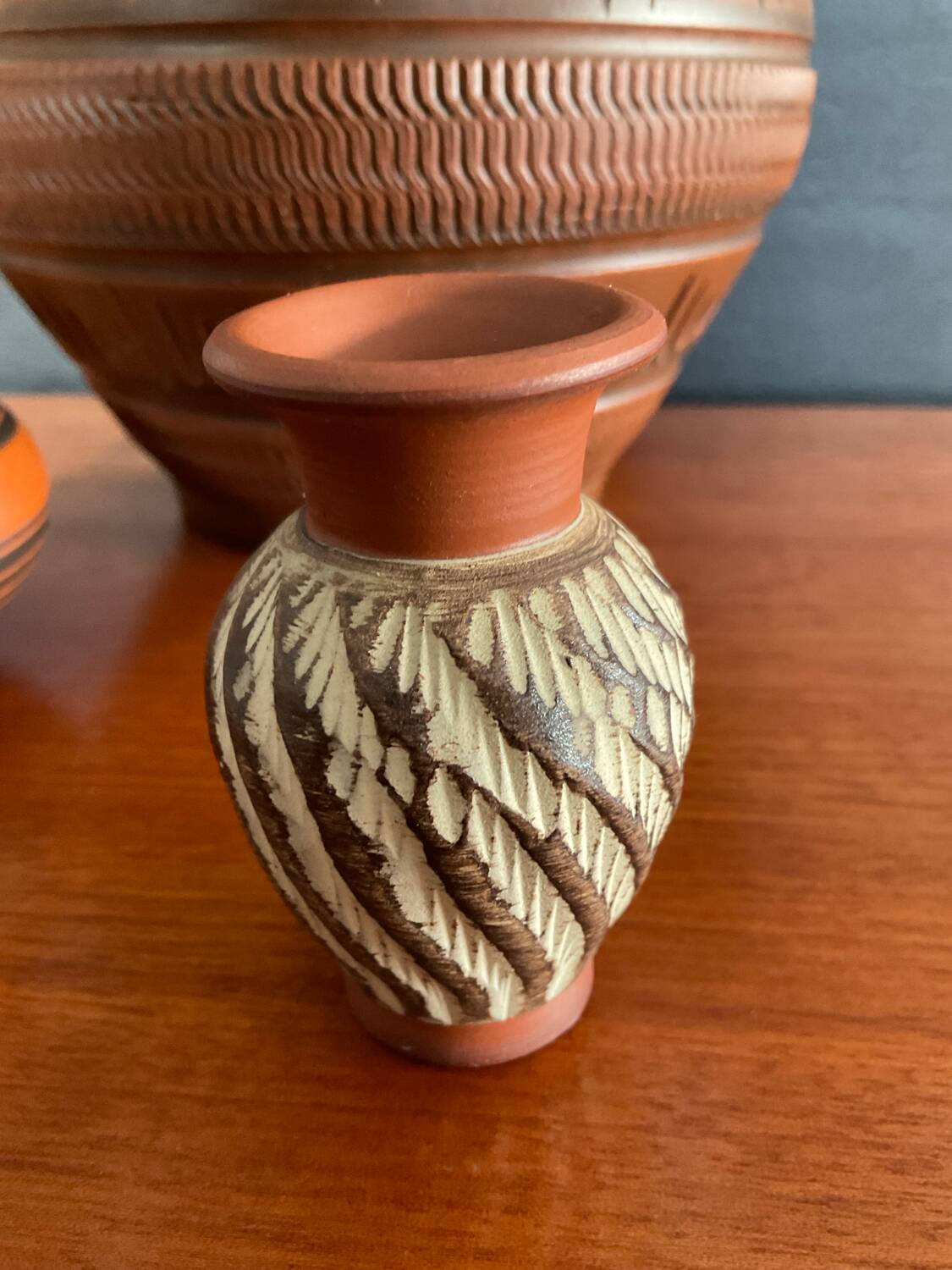 Trio of vintage vases in chiselled terracotta