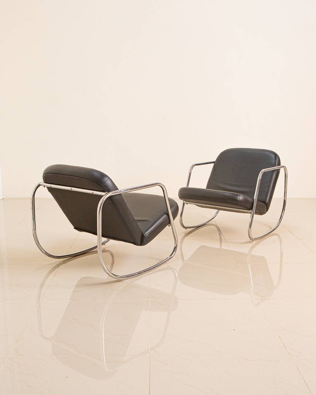 Pair of 60's "Rocking chair" lounge chairs