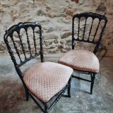 Pair of antique Napoleon III chairs in blackened wood and fabric