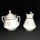 Porcelain sweetener and milk jug with cipher