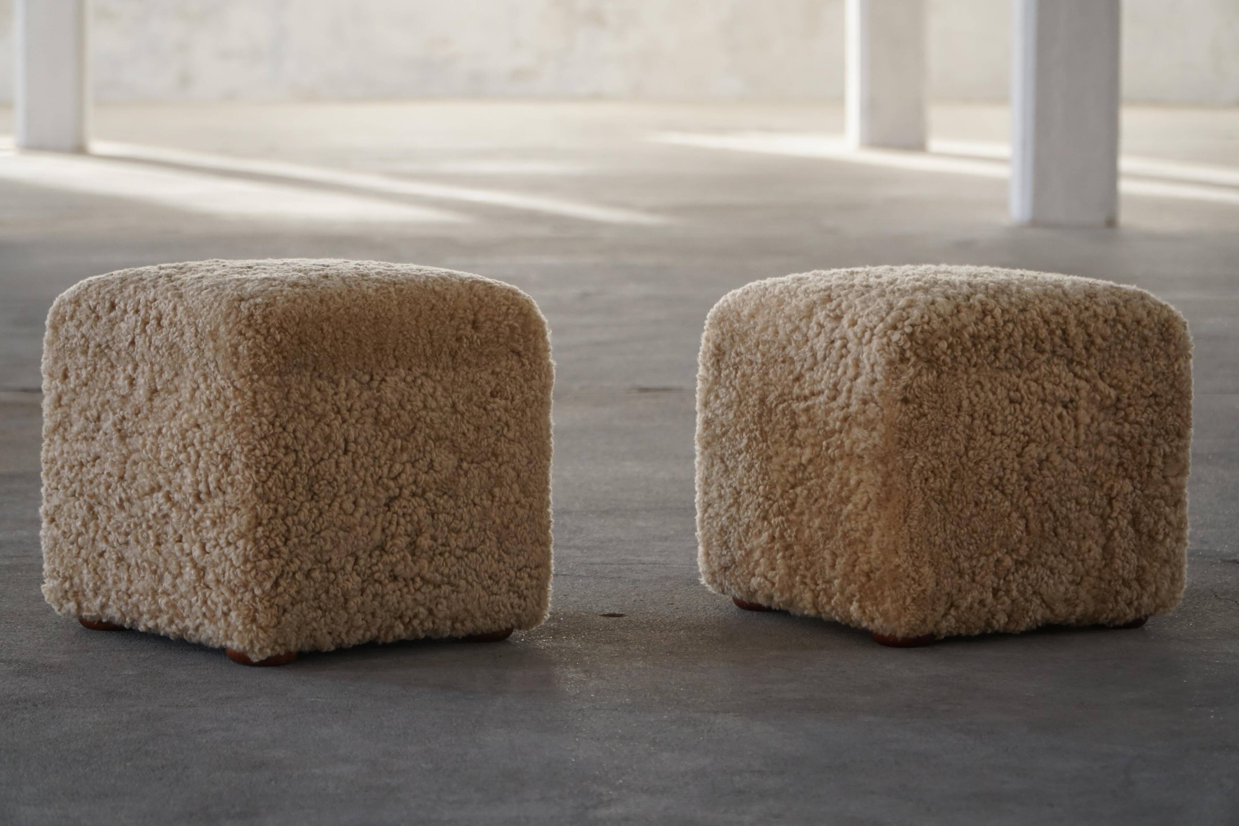French mid-century cube poufs, a pair of lambswool stools, 1960s.