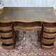 English desk from the 1950s in mahogany with a leather top.