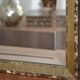 Large bevelled khaki mirror in mother-of-pearl from the 70s/80s.