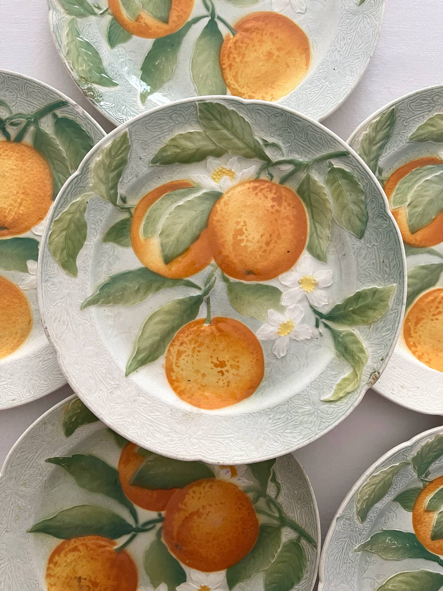 6 orange barbotine dessert plates from Saint Clément earthenware.