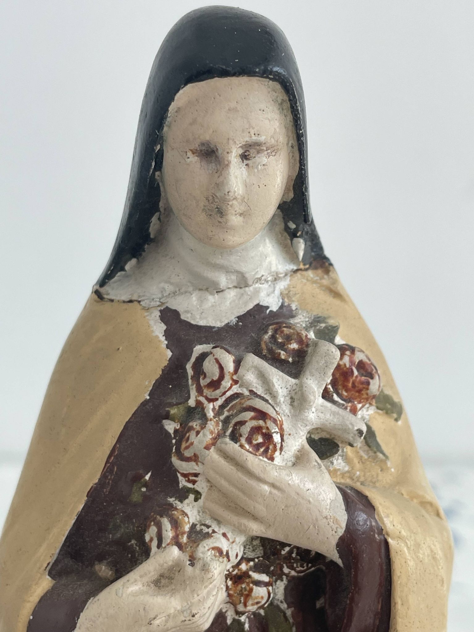 Antique statue of Saint Therese of Lisieux, religious plaster figurine
