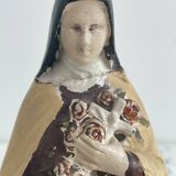 Antique statue of Saint Therese of Lisieux, religious plaster figurine