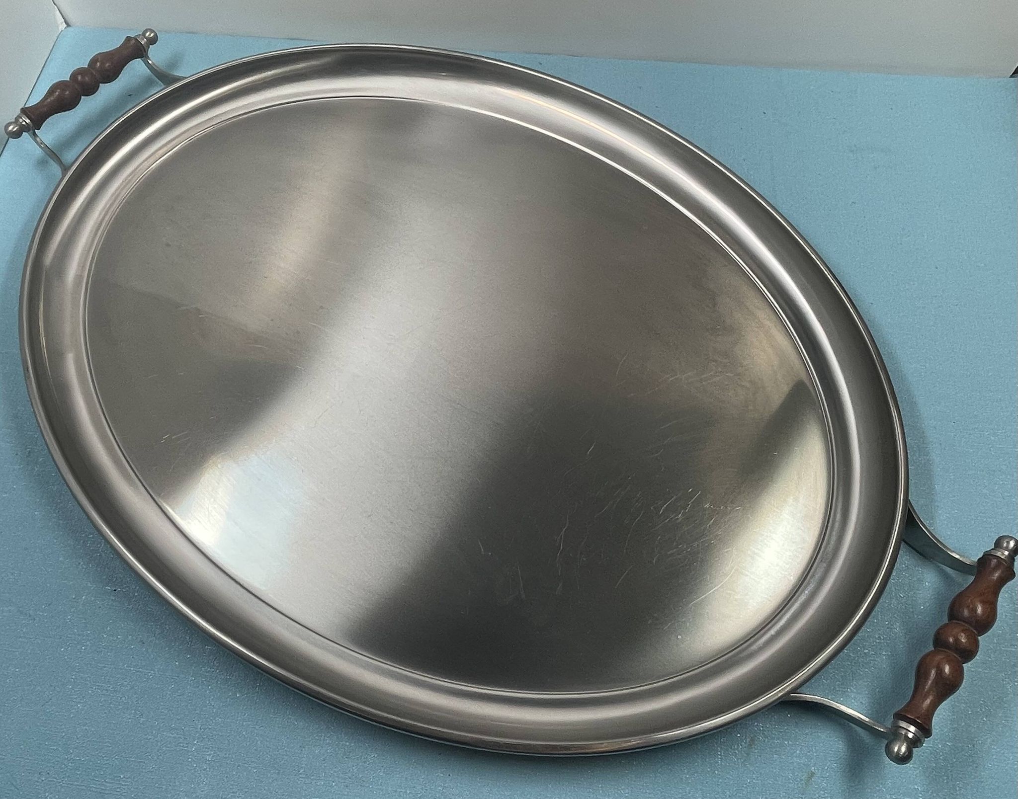 oblong tray in stainless steel and wood by goldsmith Jean Couzon