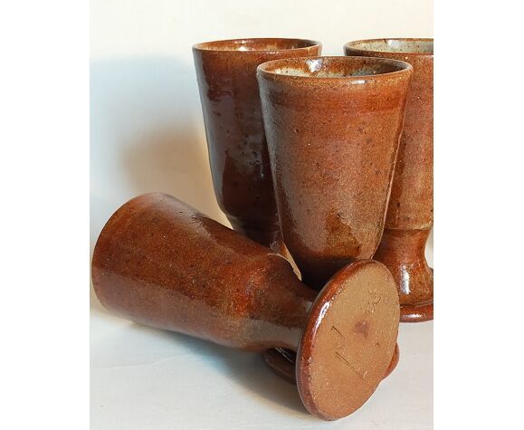 Five ancient potter's mazagrans in enamelled sandstone