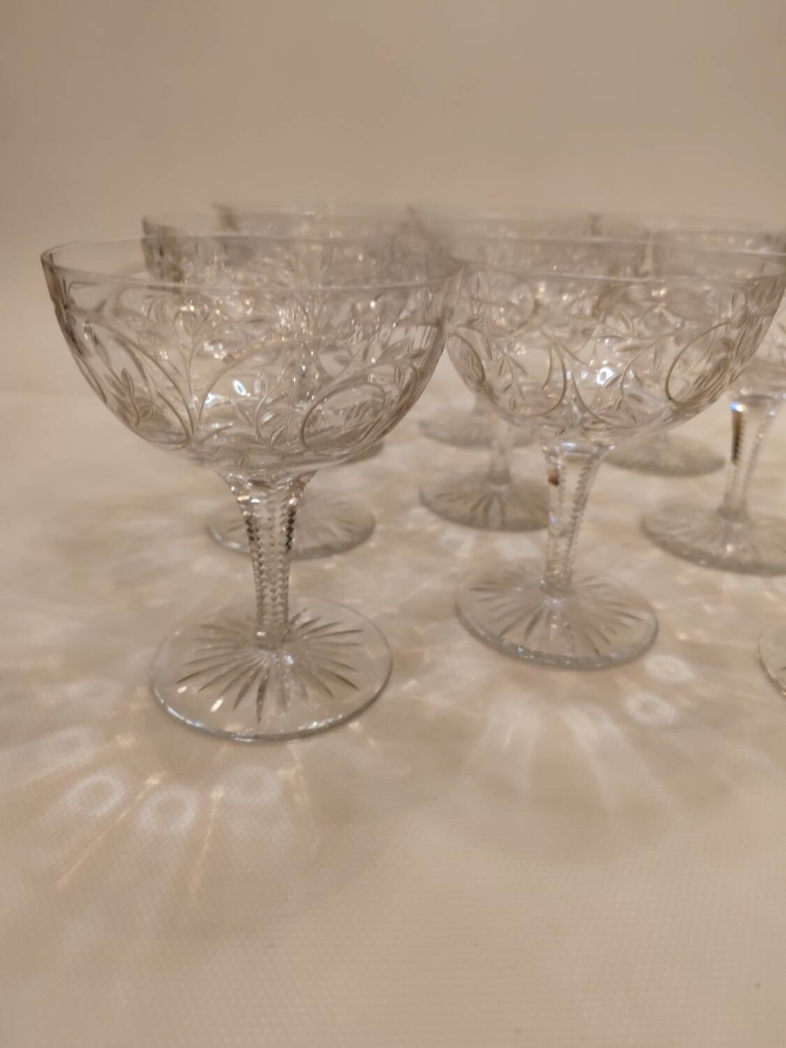 9 Clichy crystal champagne glasses, 19th century
