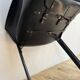 Set of 6 black leather armchairs from the 1970s