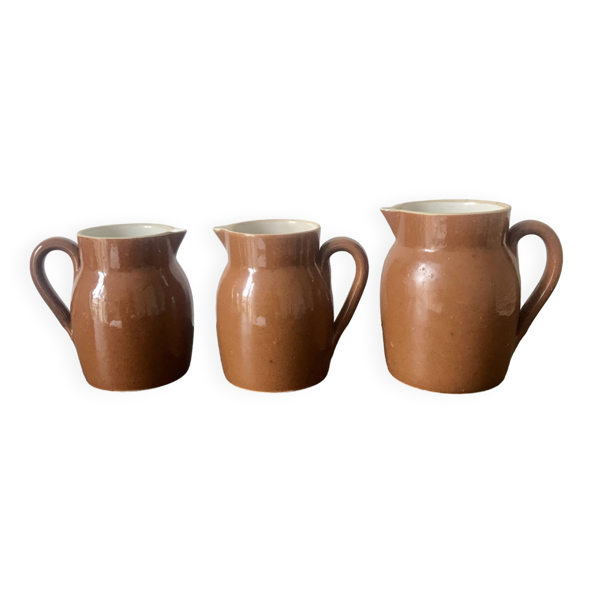 Set of 3 glazed stoneware jugs
