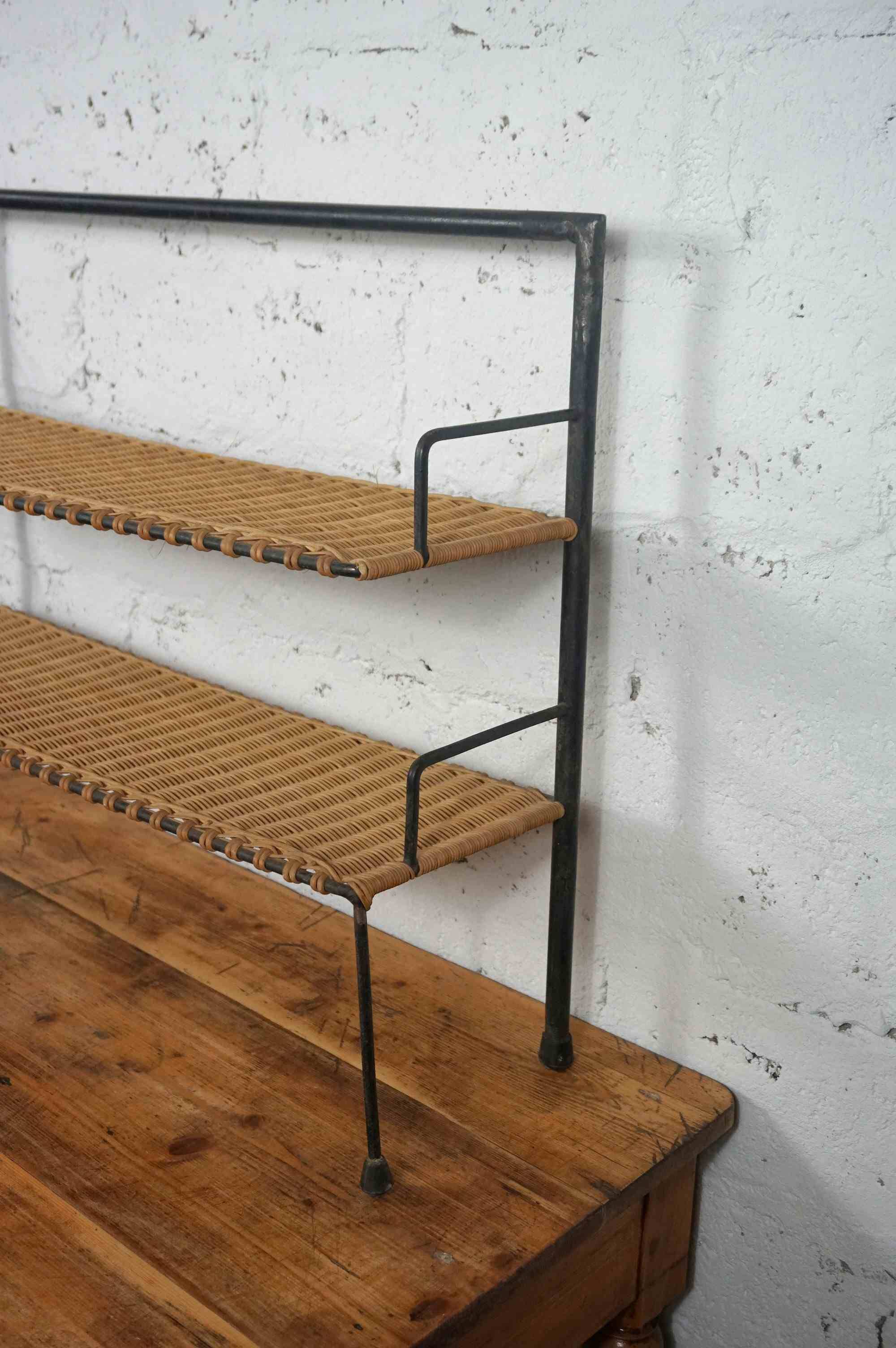 low metal and rattan shelf from the 50s