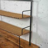 low metal and rattan shelf from the 50s