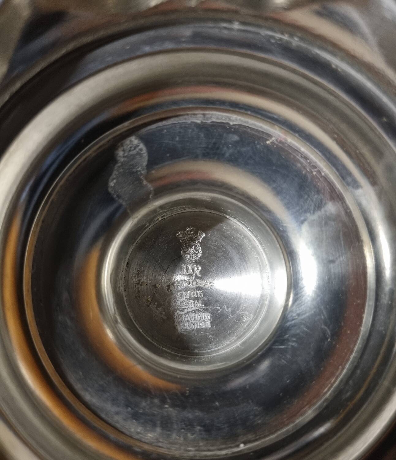 Burgundy footed cup in pewter with ram's head