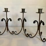 Trio of wrought iron candlesticks