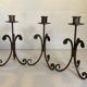 Trio of wrought iron candlesticks