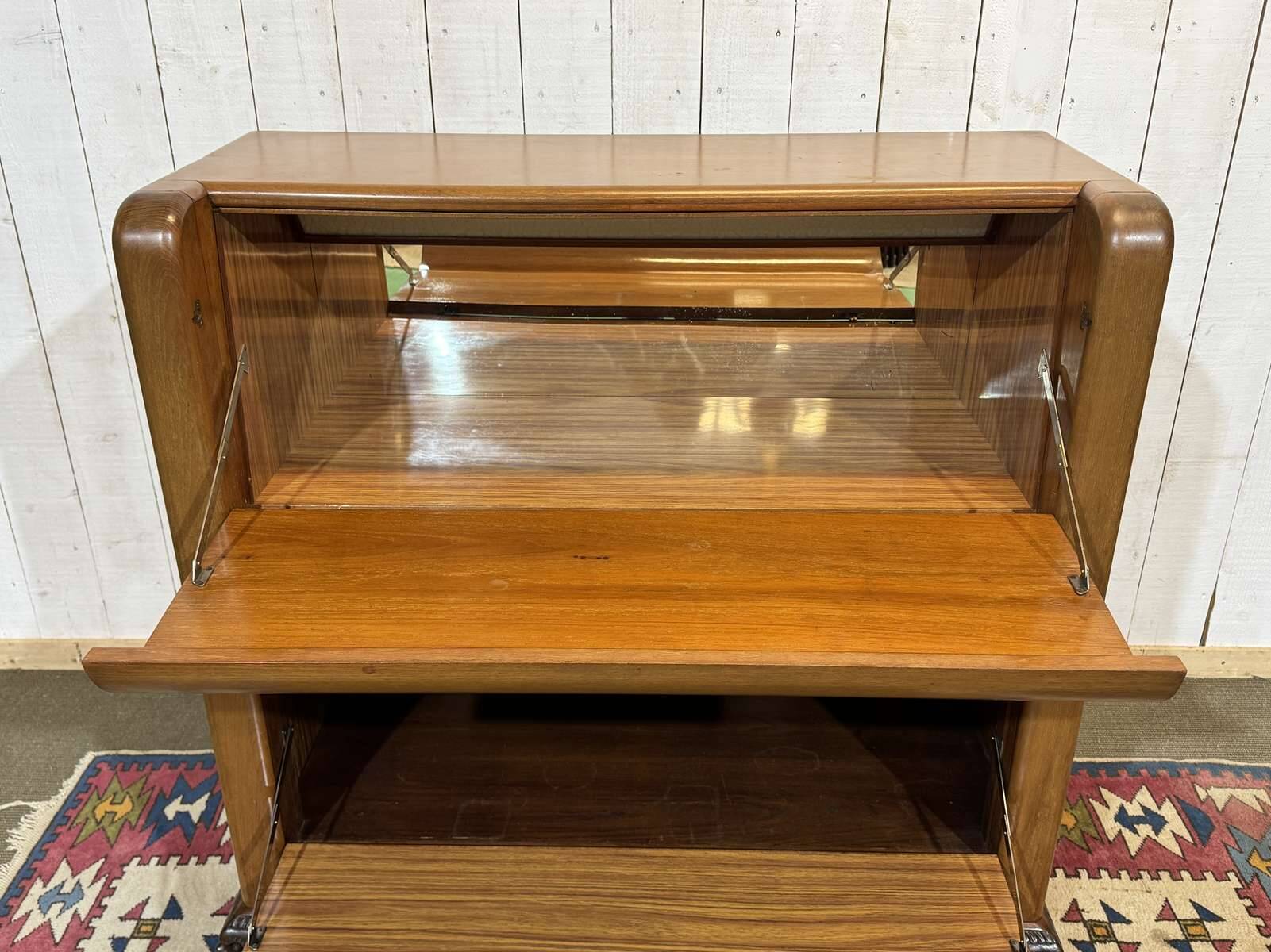 Chinese bar in richly carved teak, work from the 1980s.