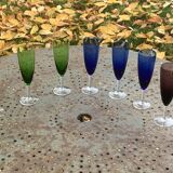 Set of 7 champagne flutes in colored glass and transparent base, vintage