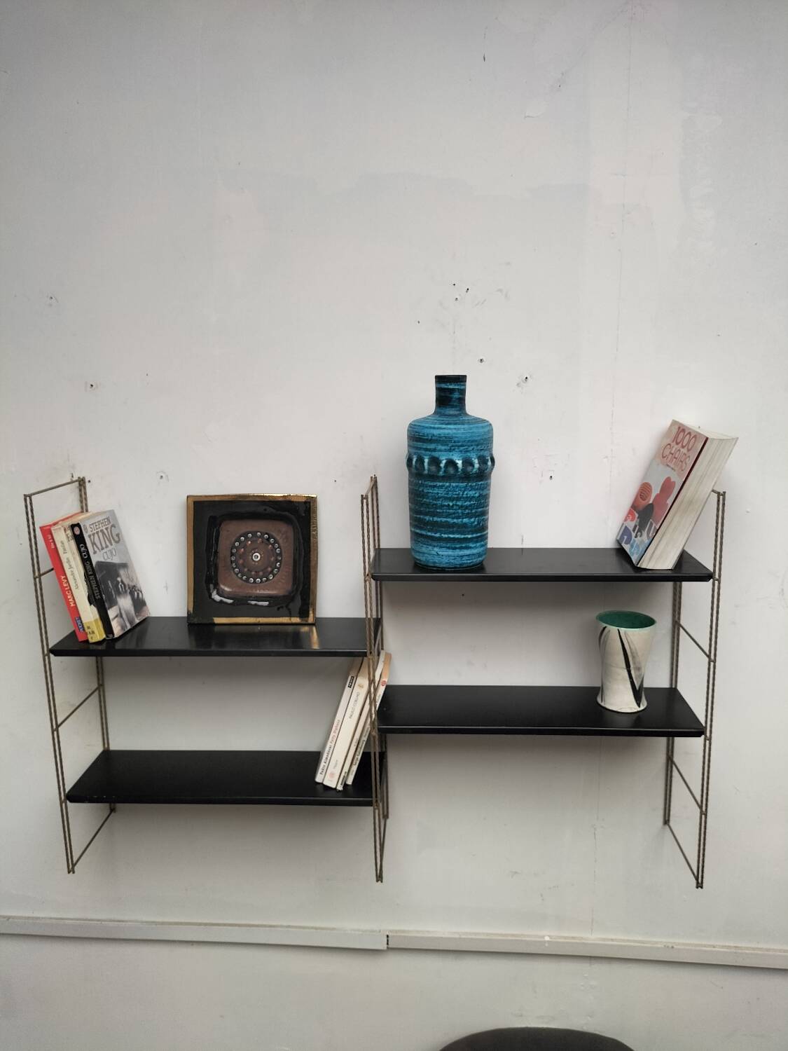 Metal wall shelf