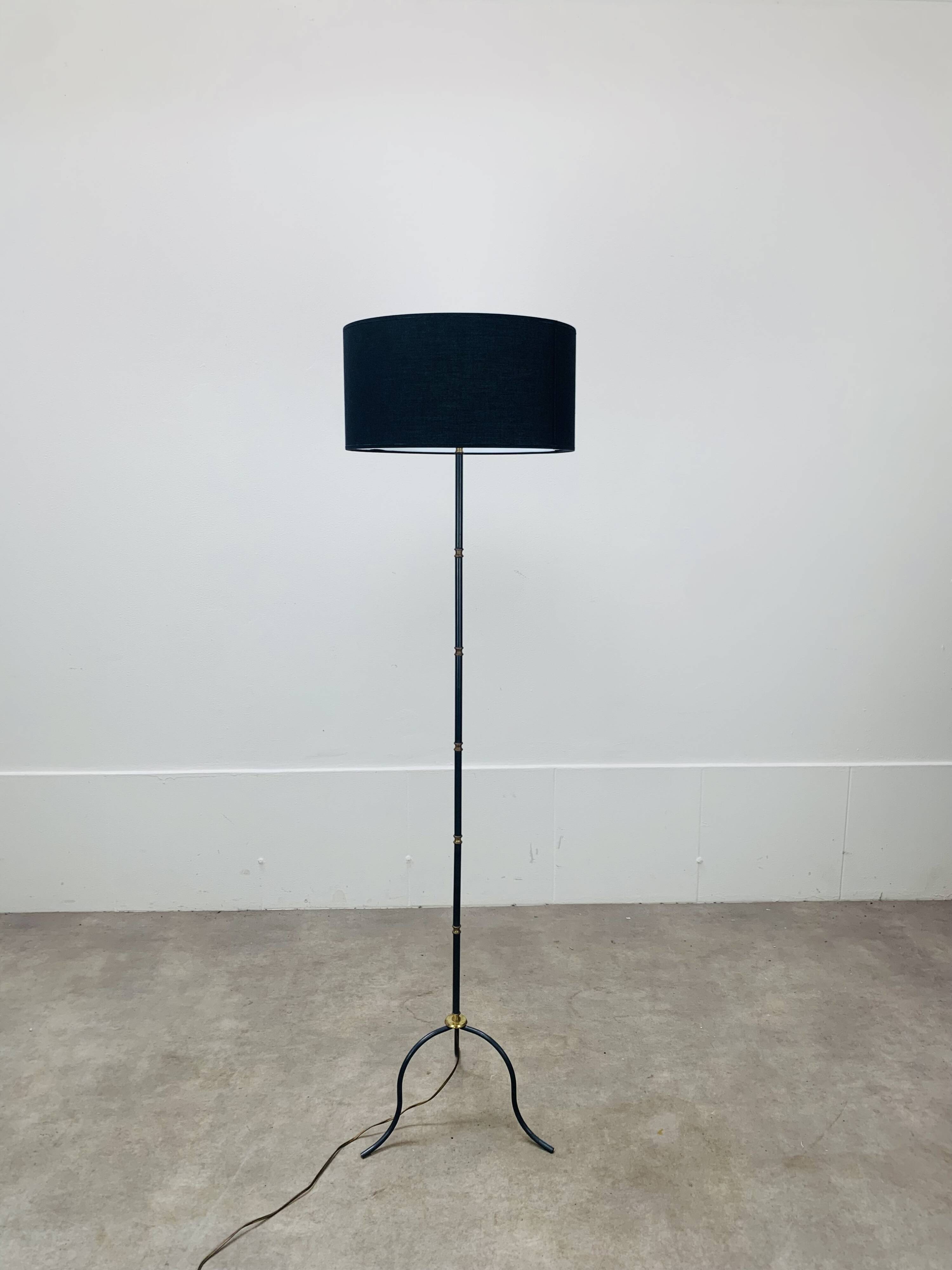 1950s tripod floor lamp, brass and black metal
