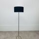 1950s tripod floor lamp, brass and black metal