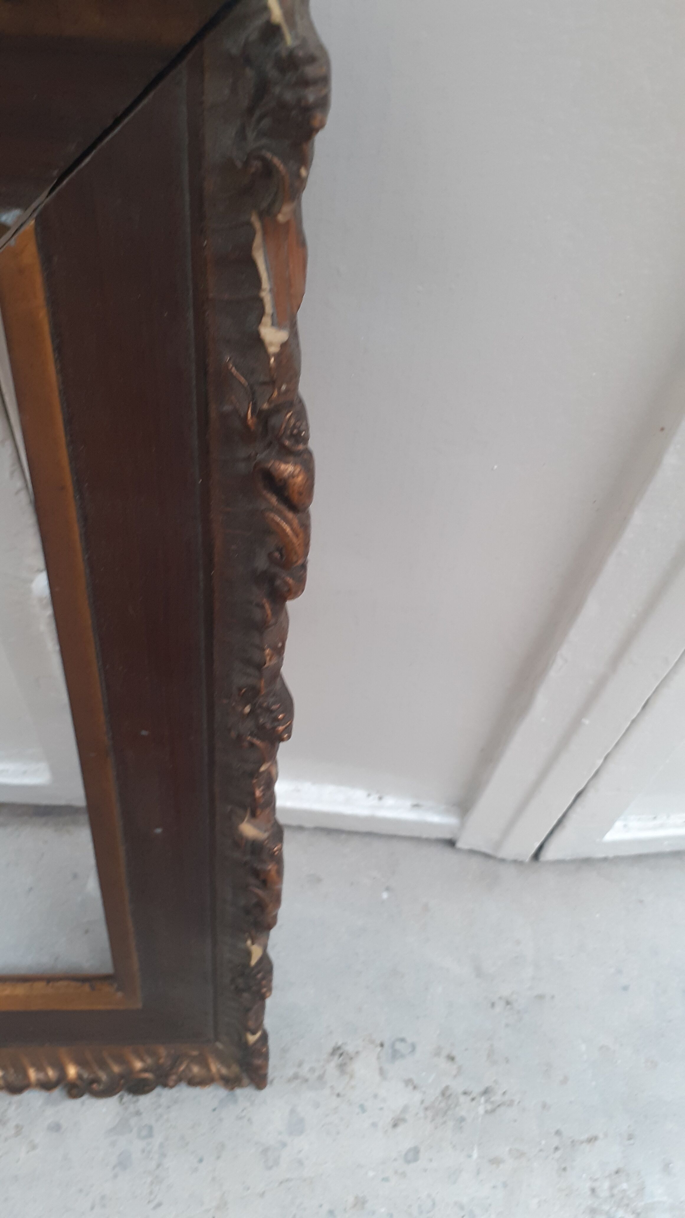 Carved frame with gilding