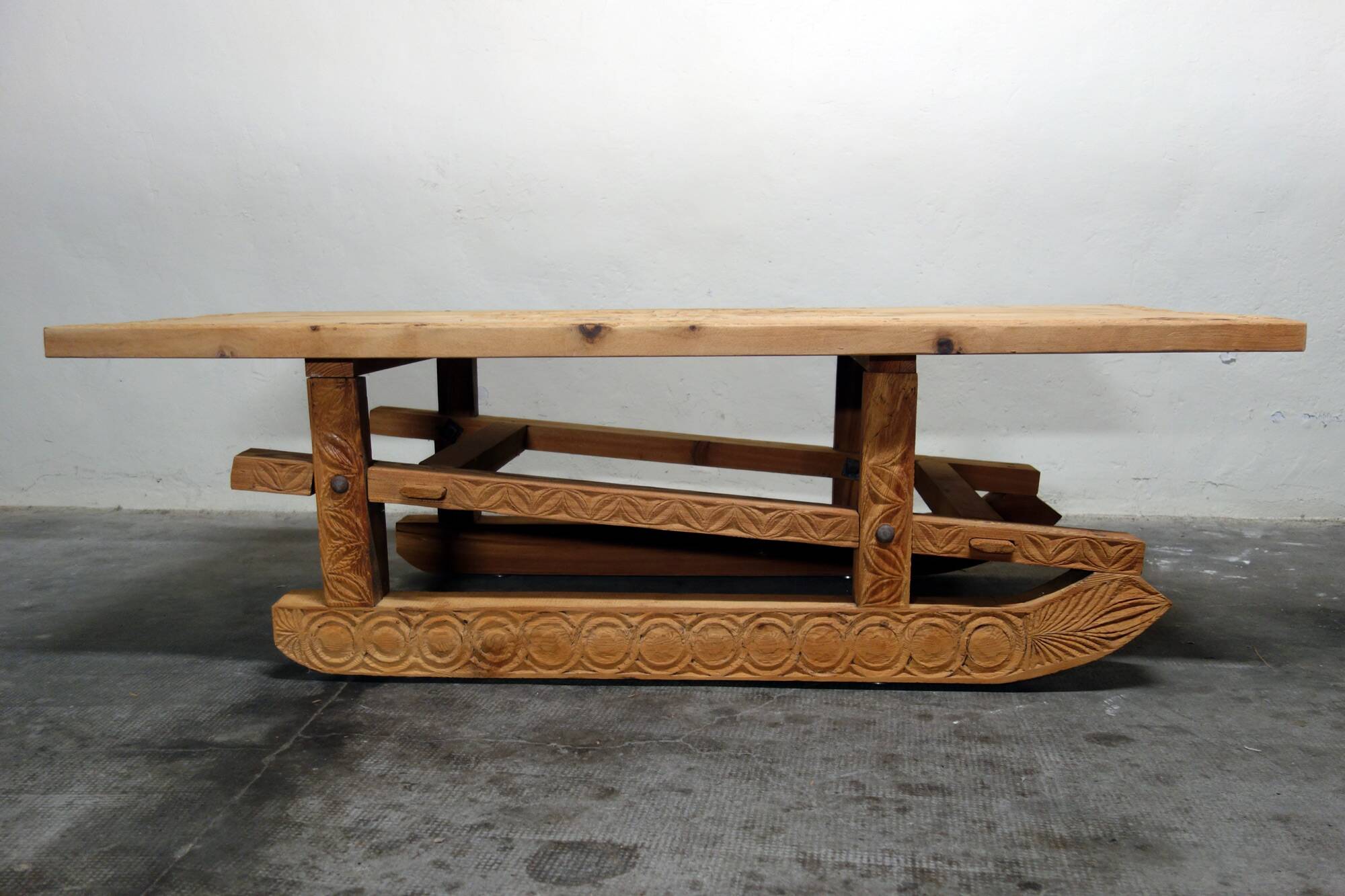 Large 19th century sculpted sled coffee table, folk art, France