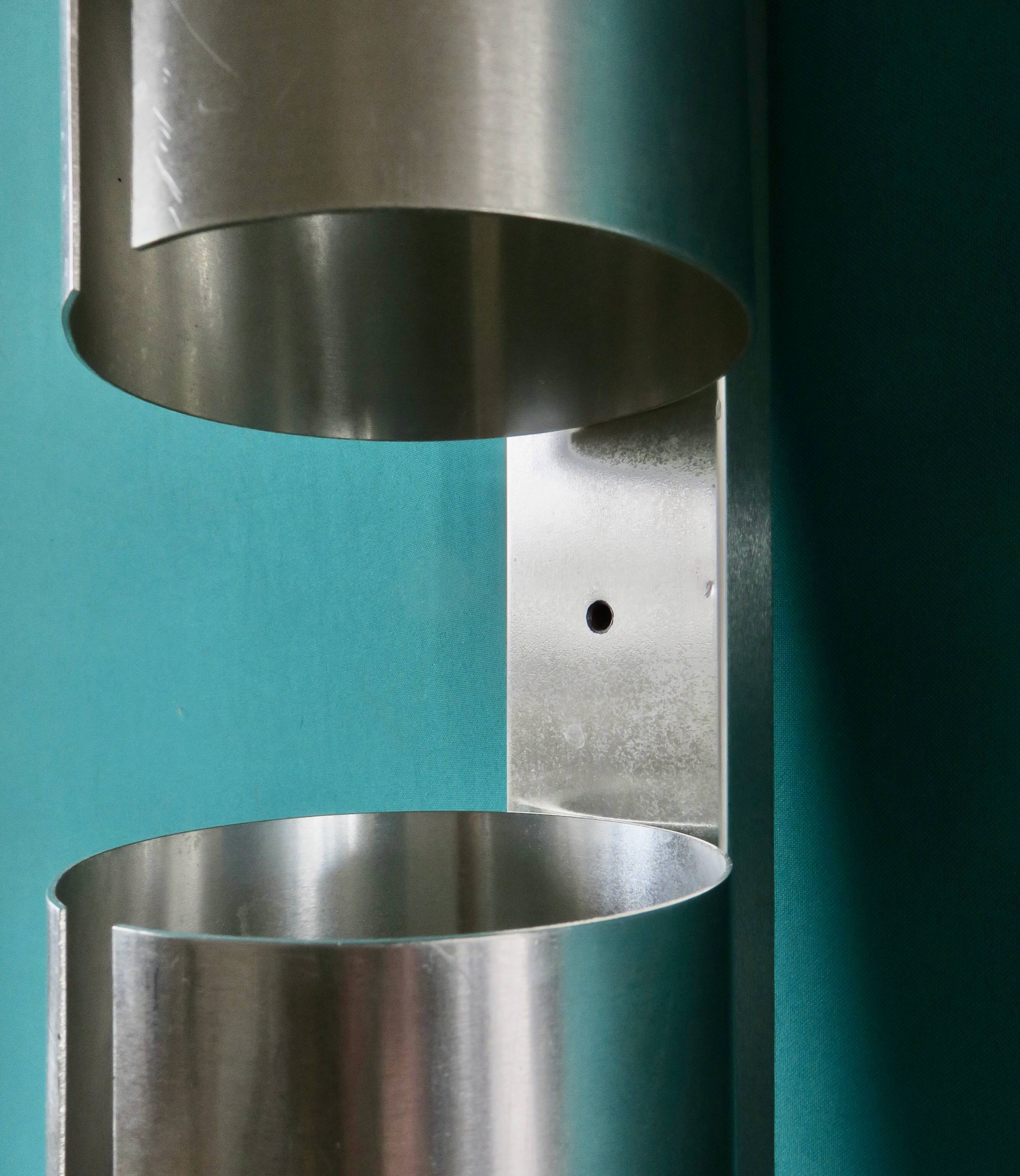 Long "SpaceAge" wall lamp in brushed aluminum. France 1970