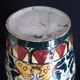 Art Deco ceramic vase with brightly colored abstract patterns