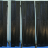 4 Pairs of wooden shutters painted black