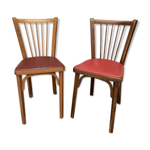 2 chaises bistrot baumann assise skai 1 rouge et 1 bordeaux