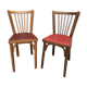 2 baumann bistro chairs sitting skai 1 red and 1 burgundy