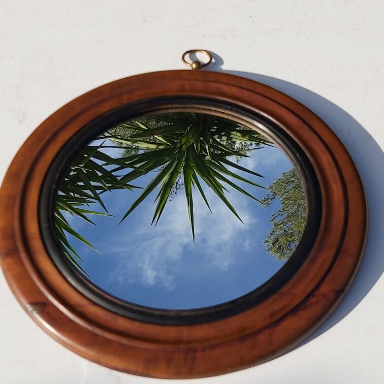 Old wooden round mirror