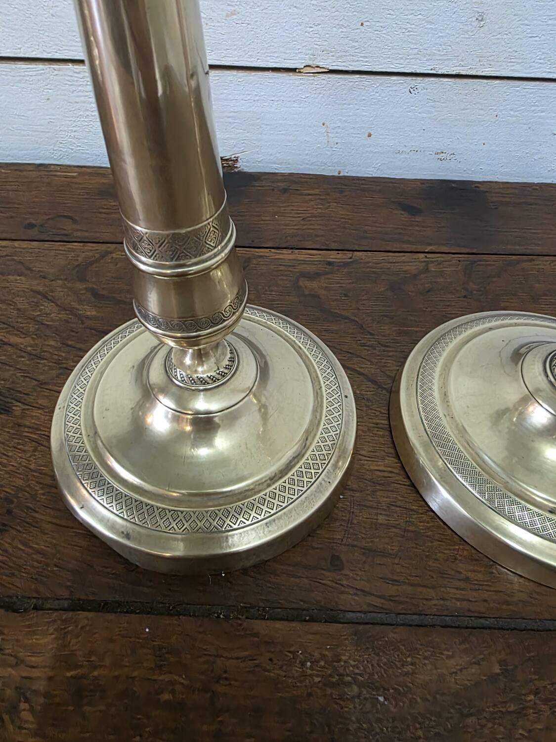 Antique pair of brass candlesticks