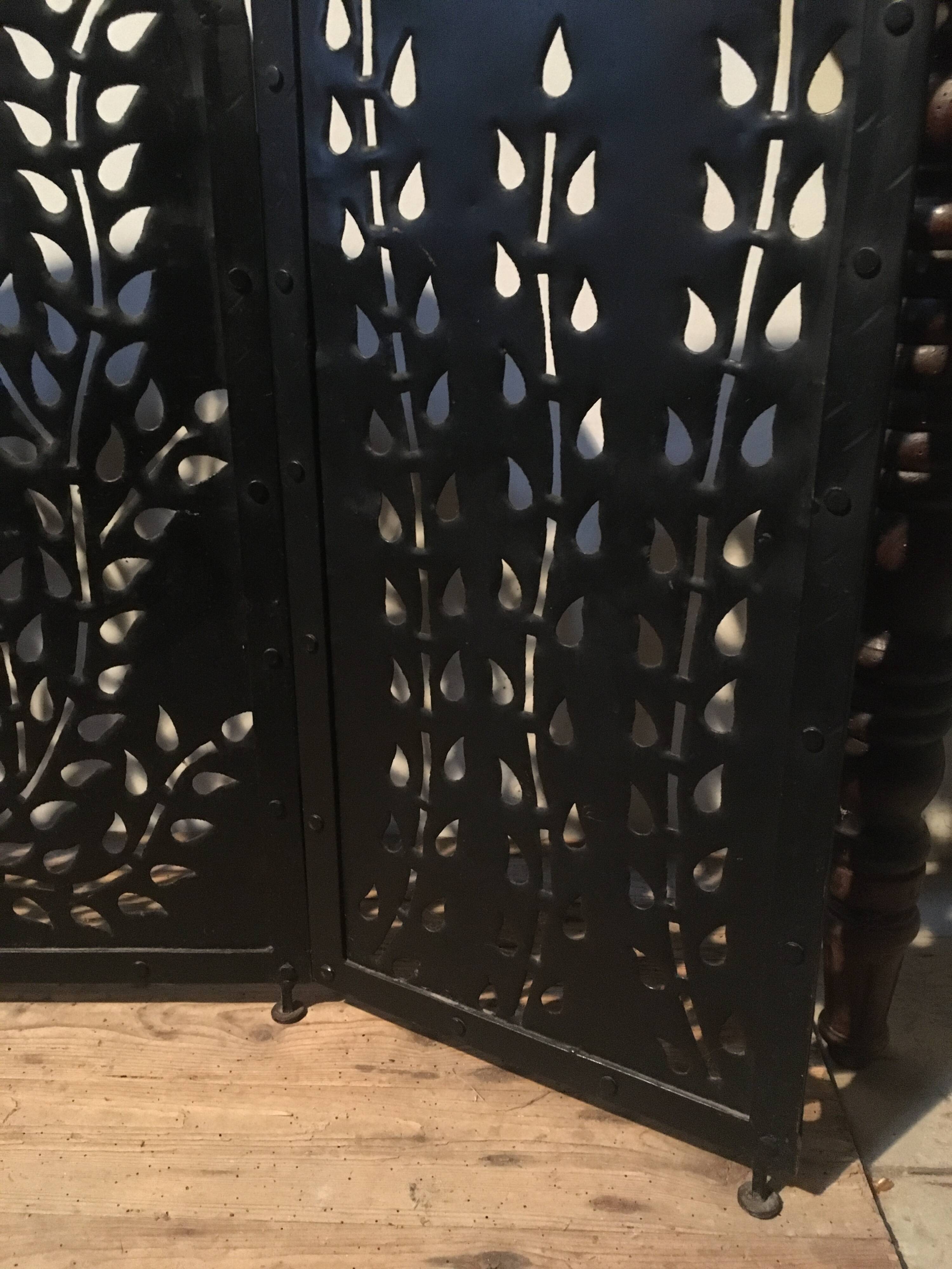 Wrought and cut metal fire screen