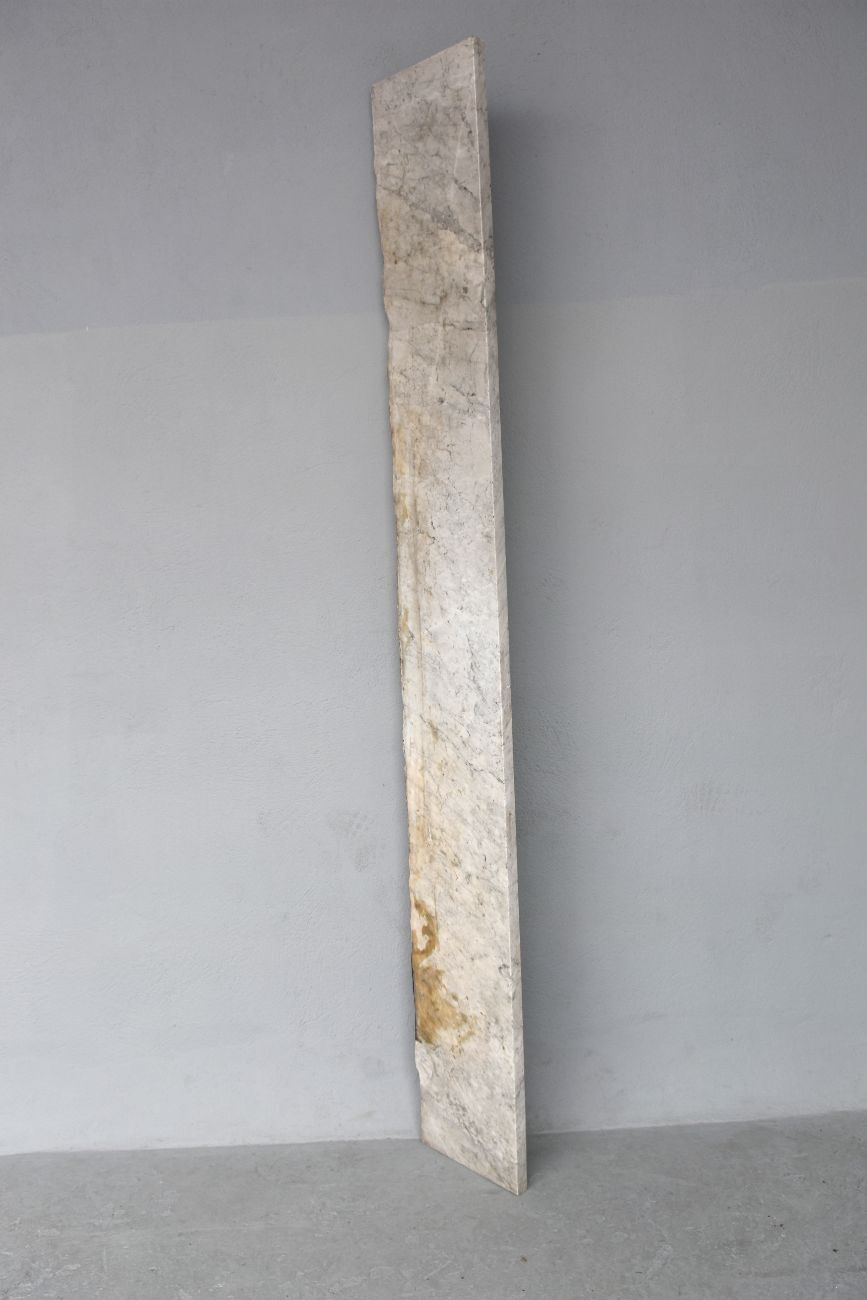 Old fireplace in white marble veined Louis XVI