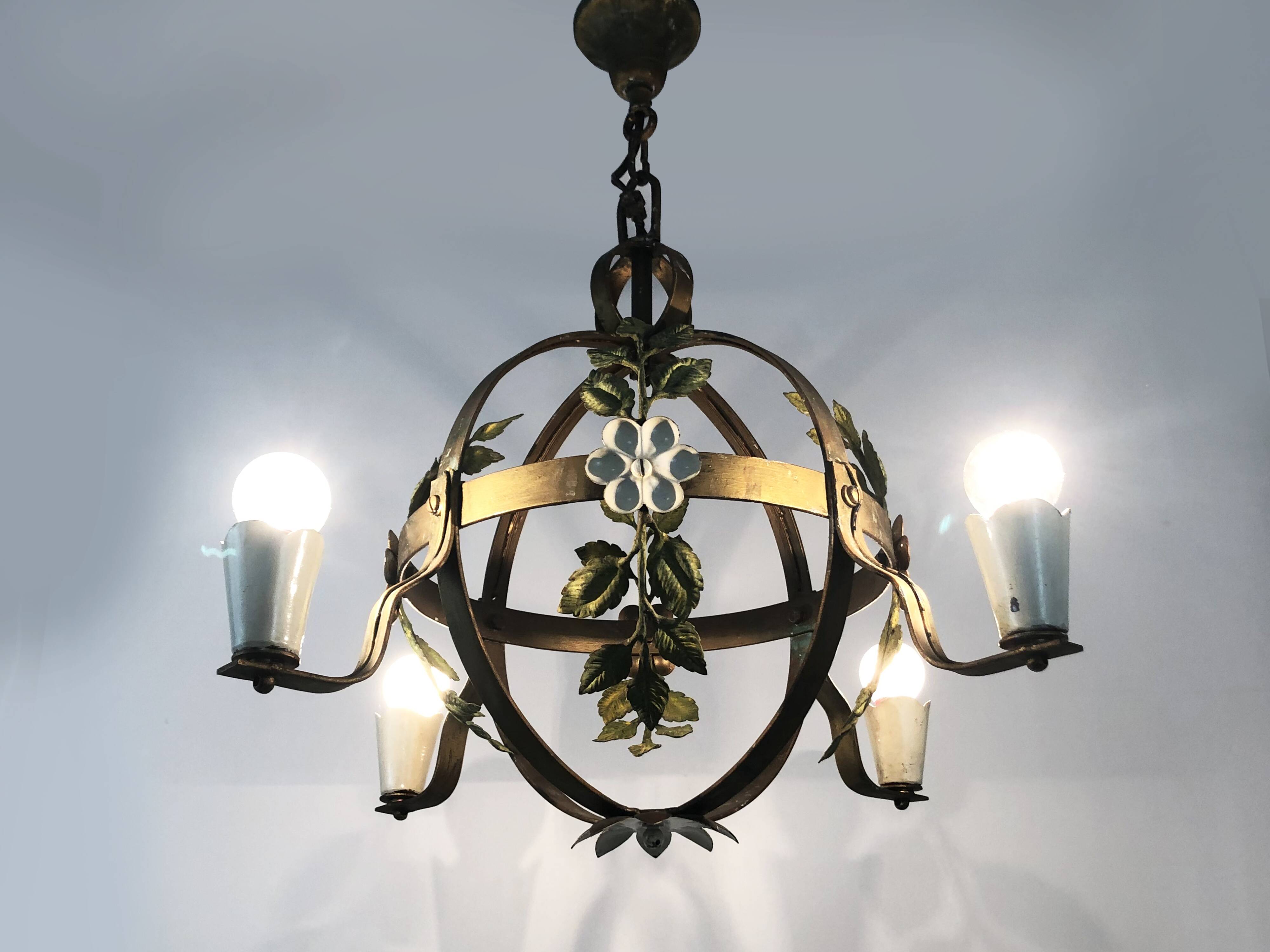 4-light ball-shaped chandelier with foliage. Italy. The 50's
