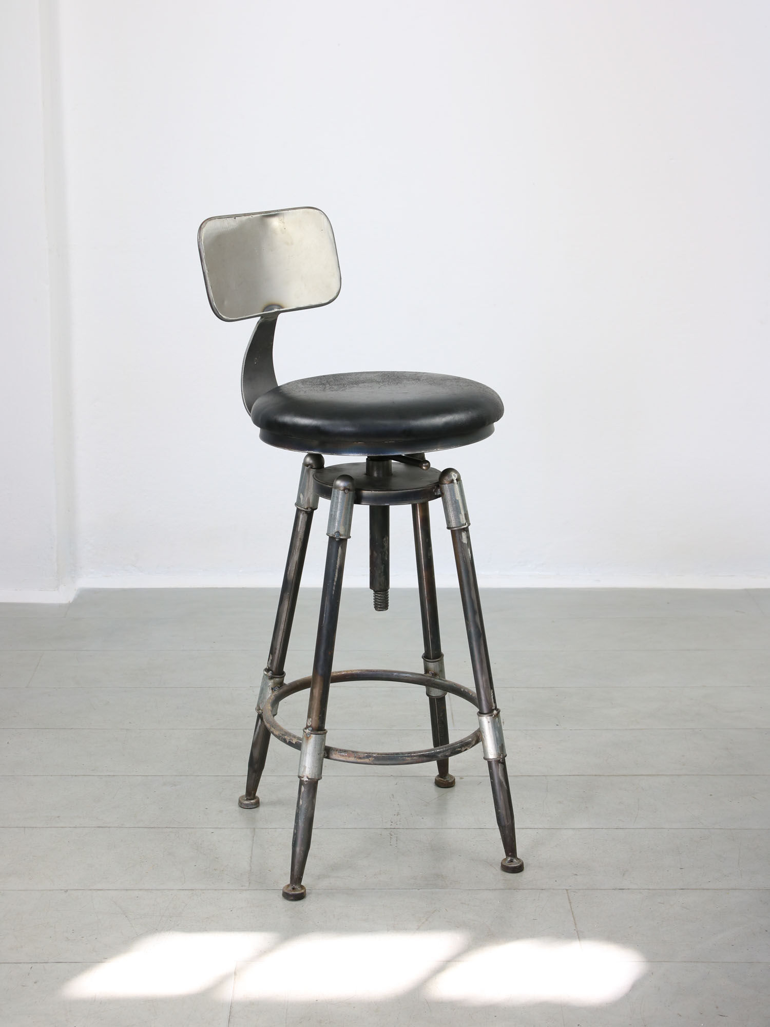 Vintage industrial metal & leather swivel bar stool