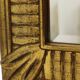 Miroir Deknudt en or Hollywood Regency biseauté 92 cm