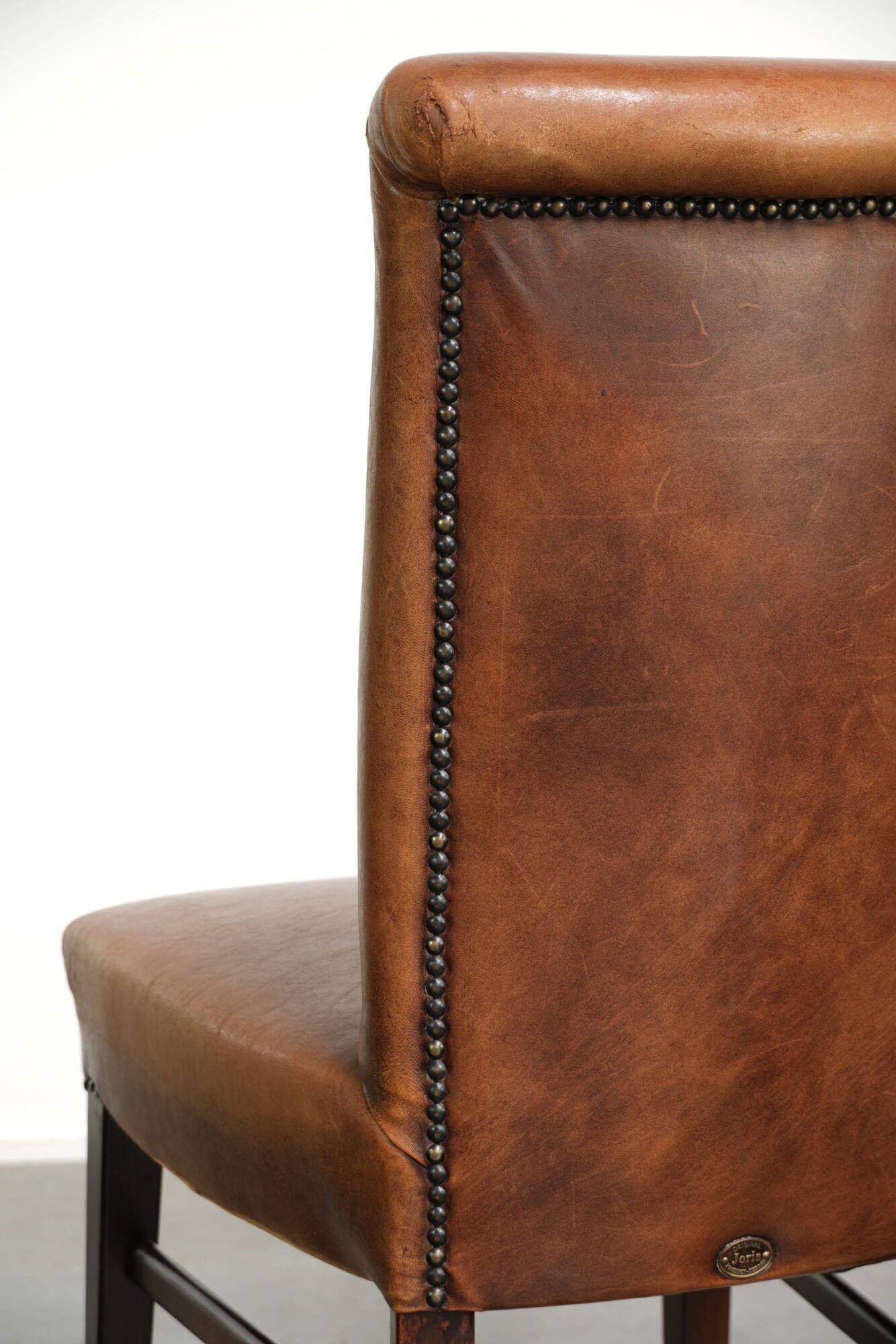 Set of 6 sheepskin dining chairs in a cognac colour with a lovely patina