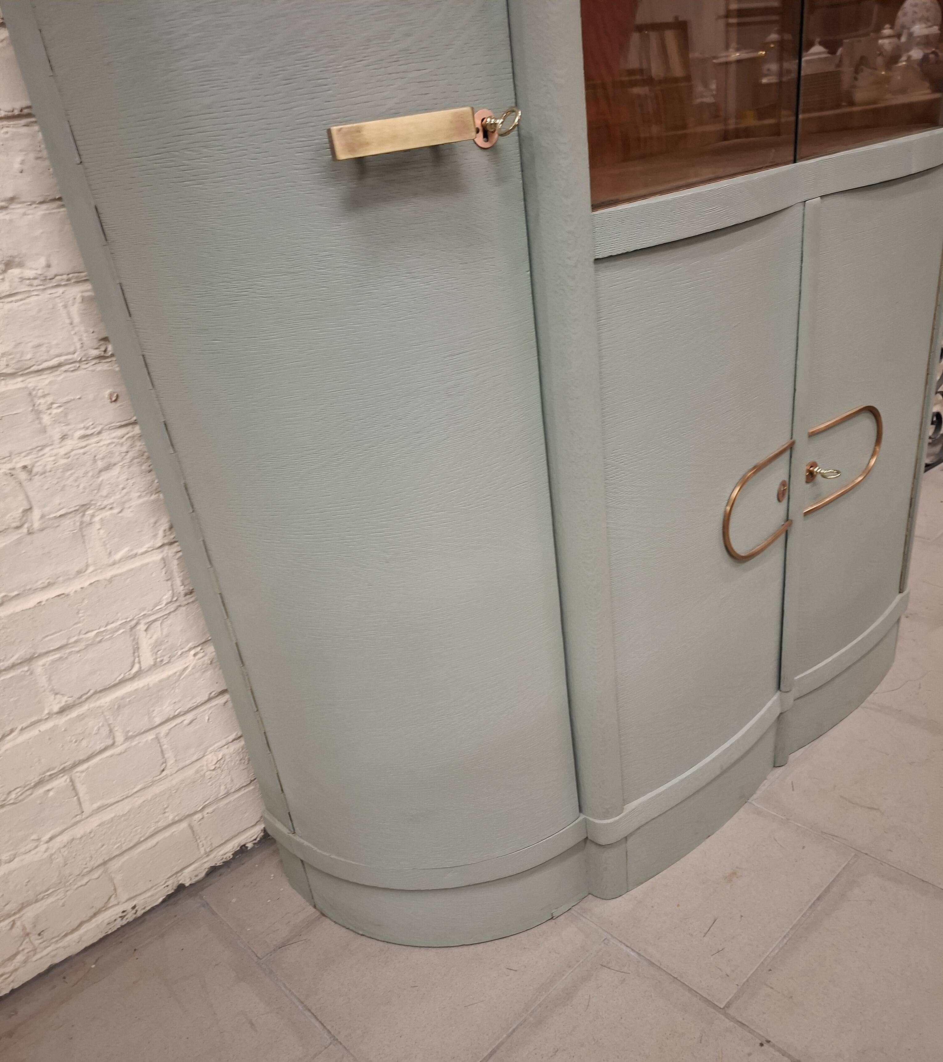 Vintage glass-fronted cabinet, bookshelf.