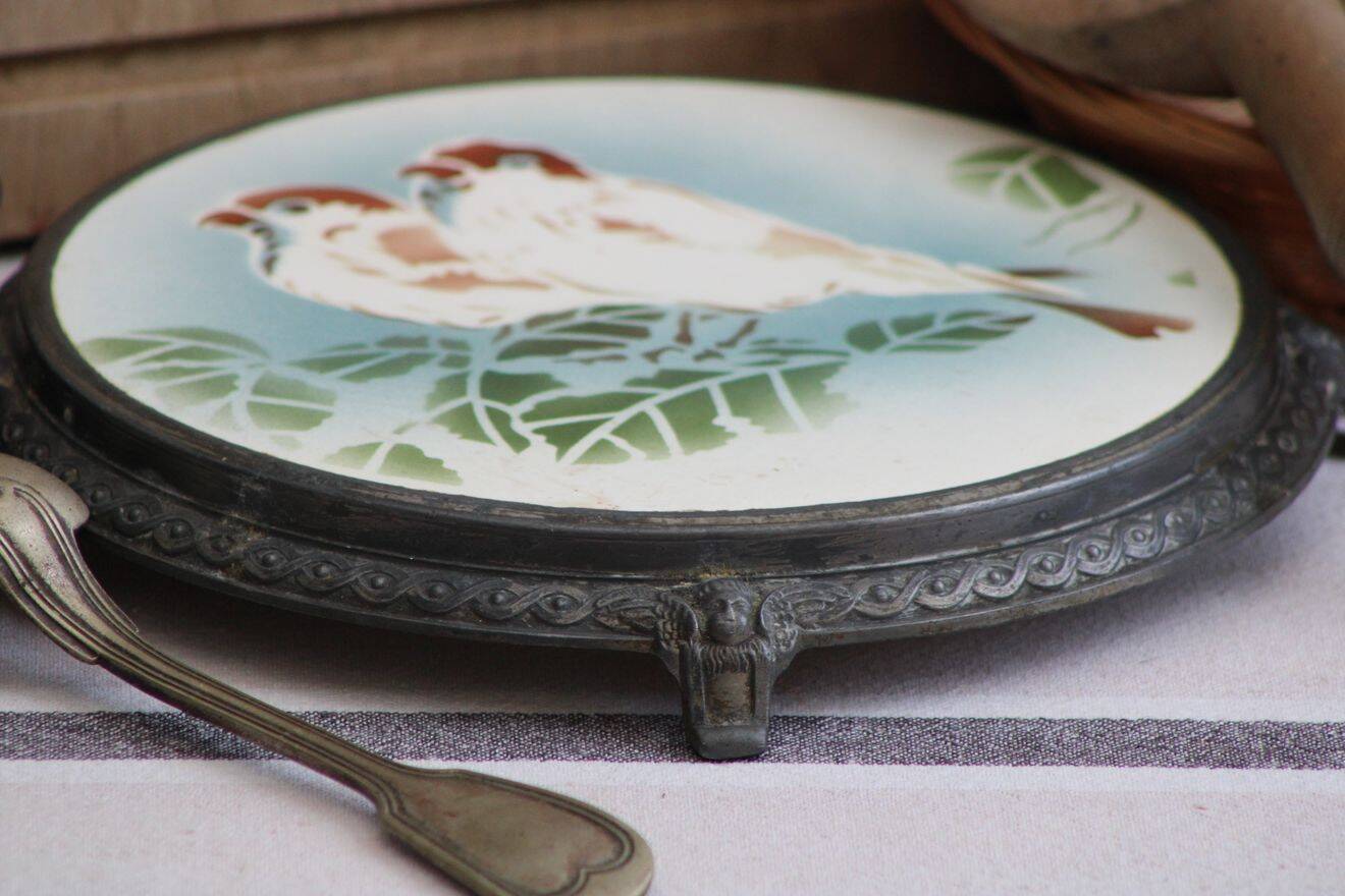 Antique ceramic trivet