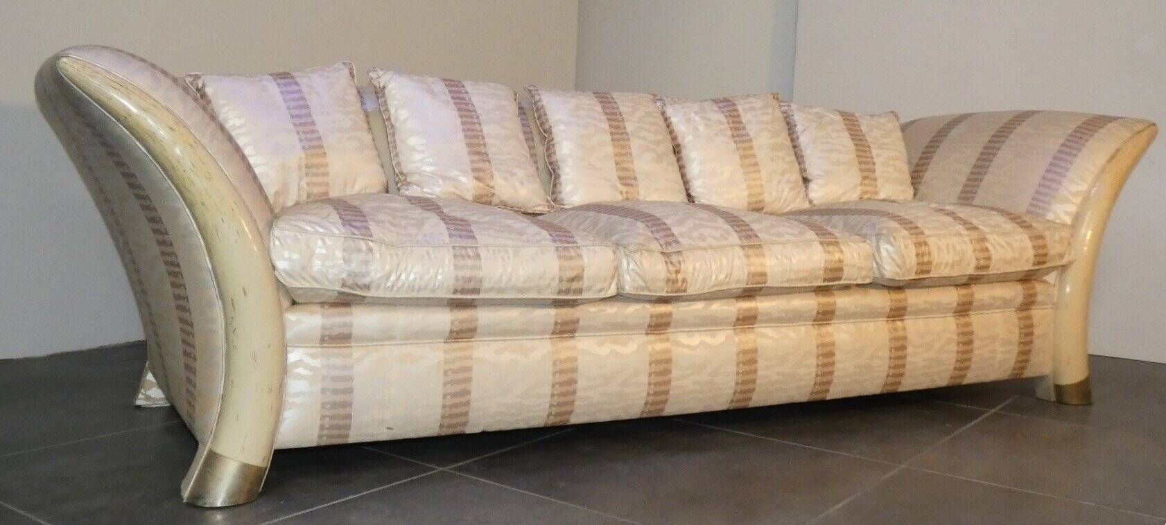 Sofa and armchair in colonial style with saber legs in resin, Italy, 1970s.