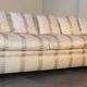 Sofa and armchair in colonial style with saber legs in resin, Italy, 1970s.
