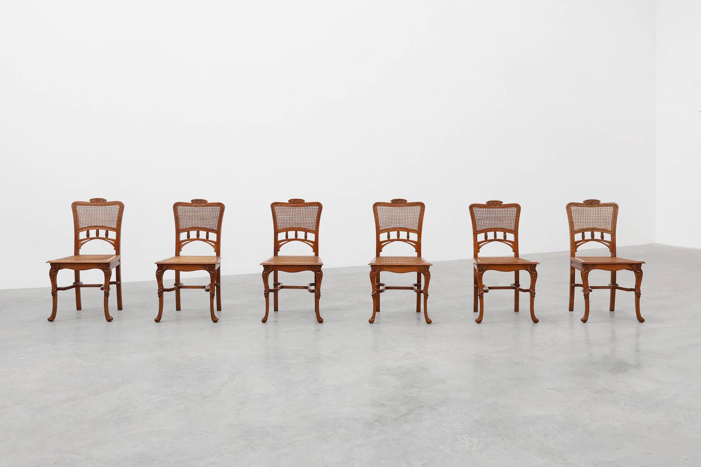 Set of 6 art nouveau dinner chairs in the manner of Victor Horta, Belgium