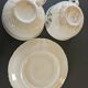 charming set of 4 cups and their 4 matching saucers in earthenware