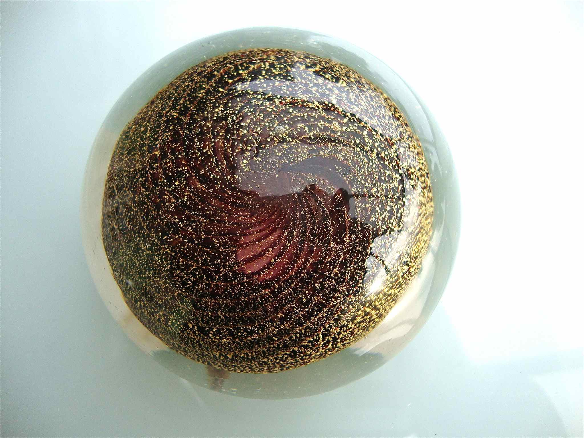 Gold spiral paper press