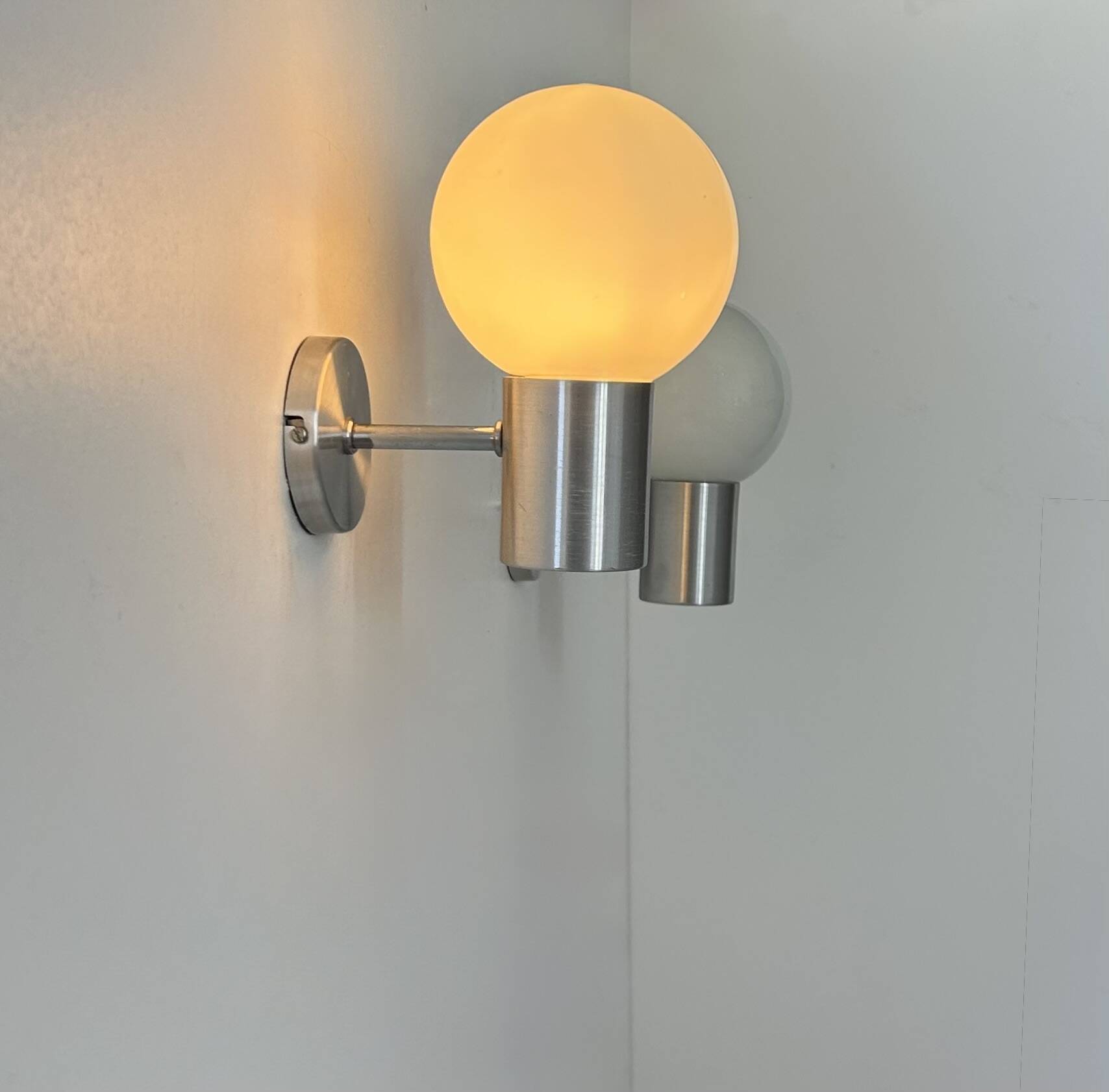 Pair of vintage wall lights, aluminum and opaline, France, 1980