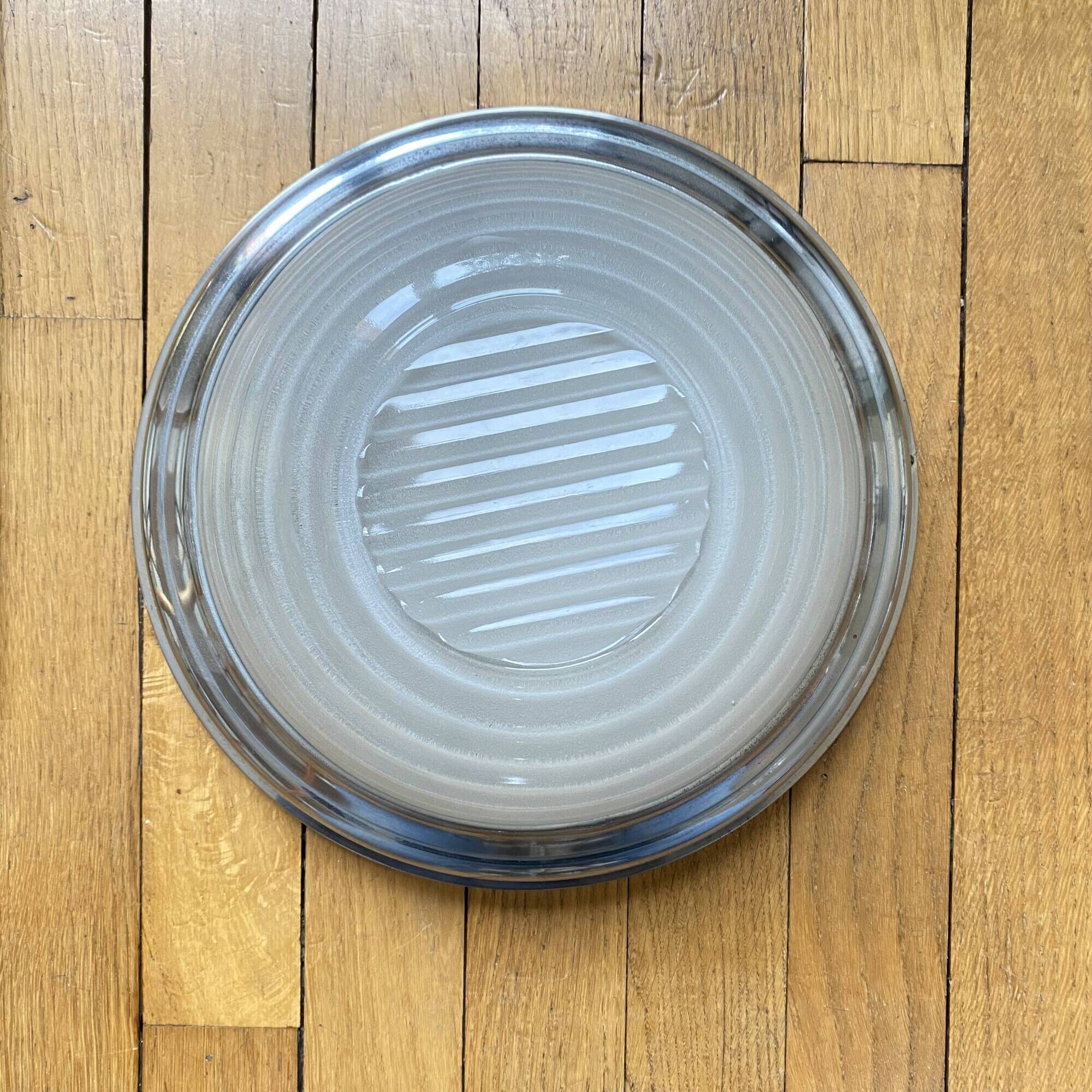 Thick glass ceiling light fixture with a chrome metal support, Holophane type.